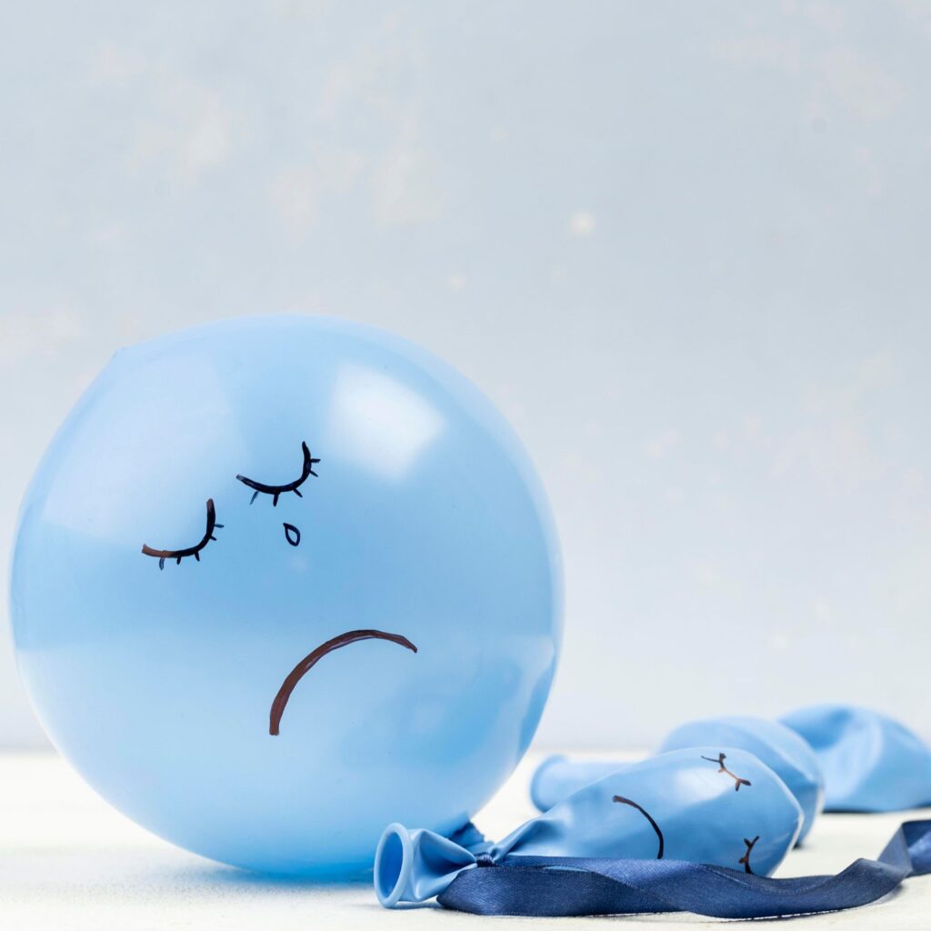 balloon with sad face